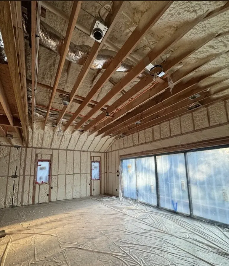 Interior walls and ceiling insulated with spray foam during new construction in Fort Myers Shores